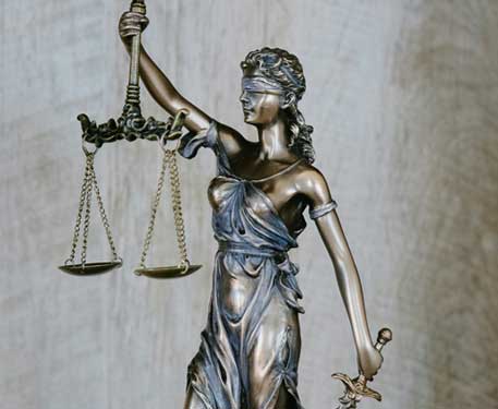 statue of lady justice from knee up